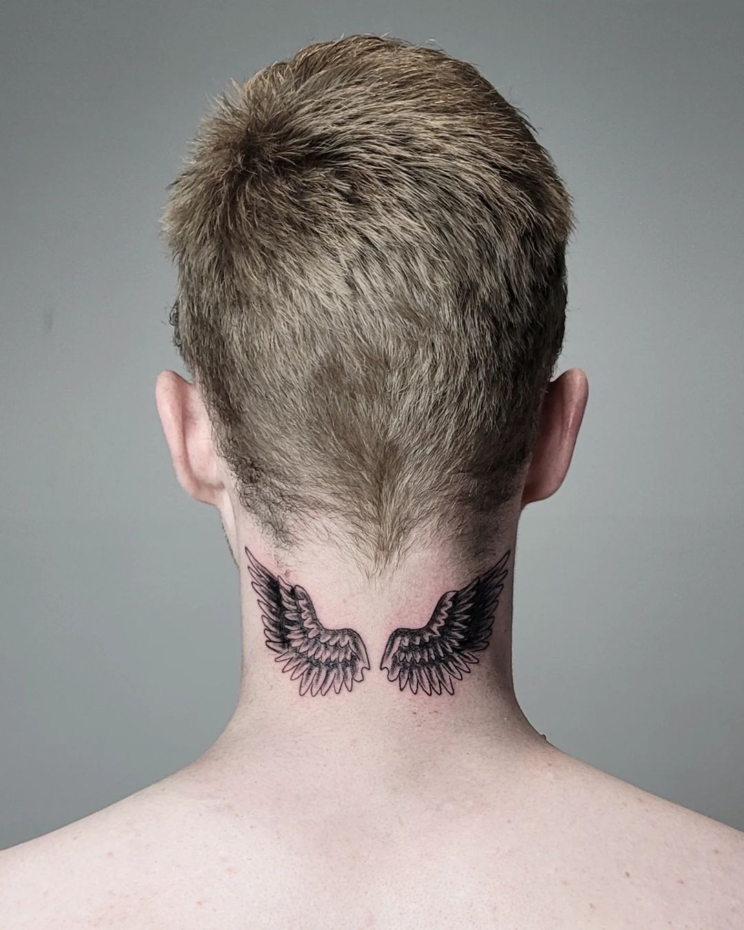 Eagle Wings Tattoo on the Back of the Neck for Men